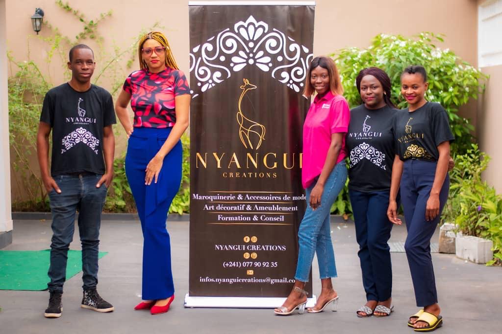 diane's workshop with artisans at showroom
